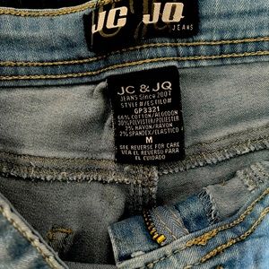 Light wash bell bottom jeans.